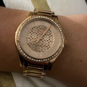 Rose gold COACH watch
